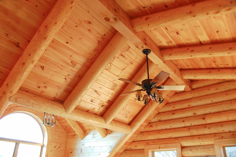 Shed Roof with Exposed Round Rafters and White Pine Tongue & Groove Paneling